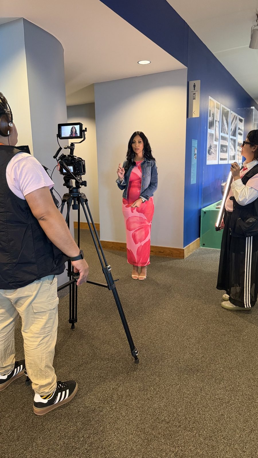 Crew filming an interview on location