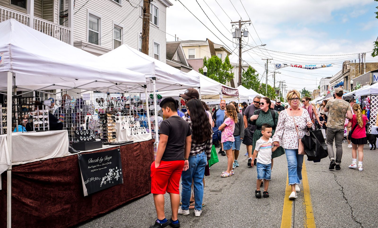 Festival vendor tents and crowd
