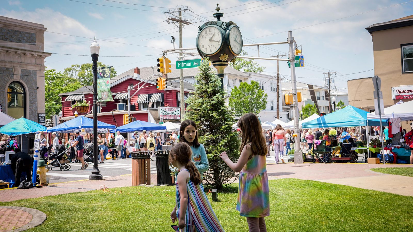 Pitman town clock and festival crowd